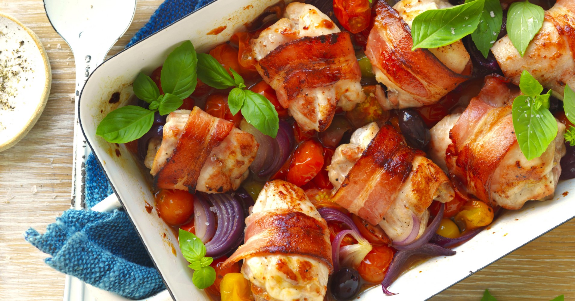 Bacon wrapped chicken thigh tray bake Recipe | myfoodbook | Baked chicken thigh recipe